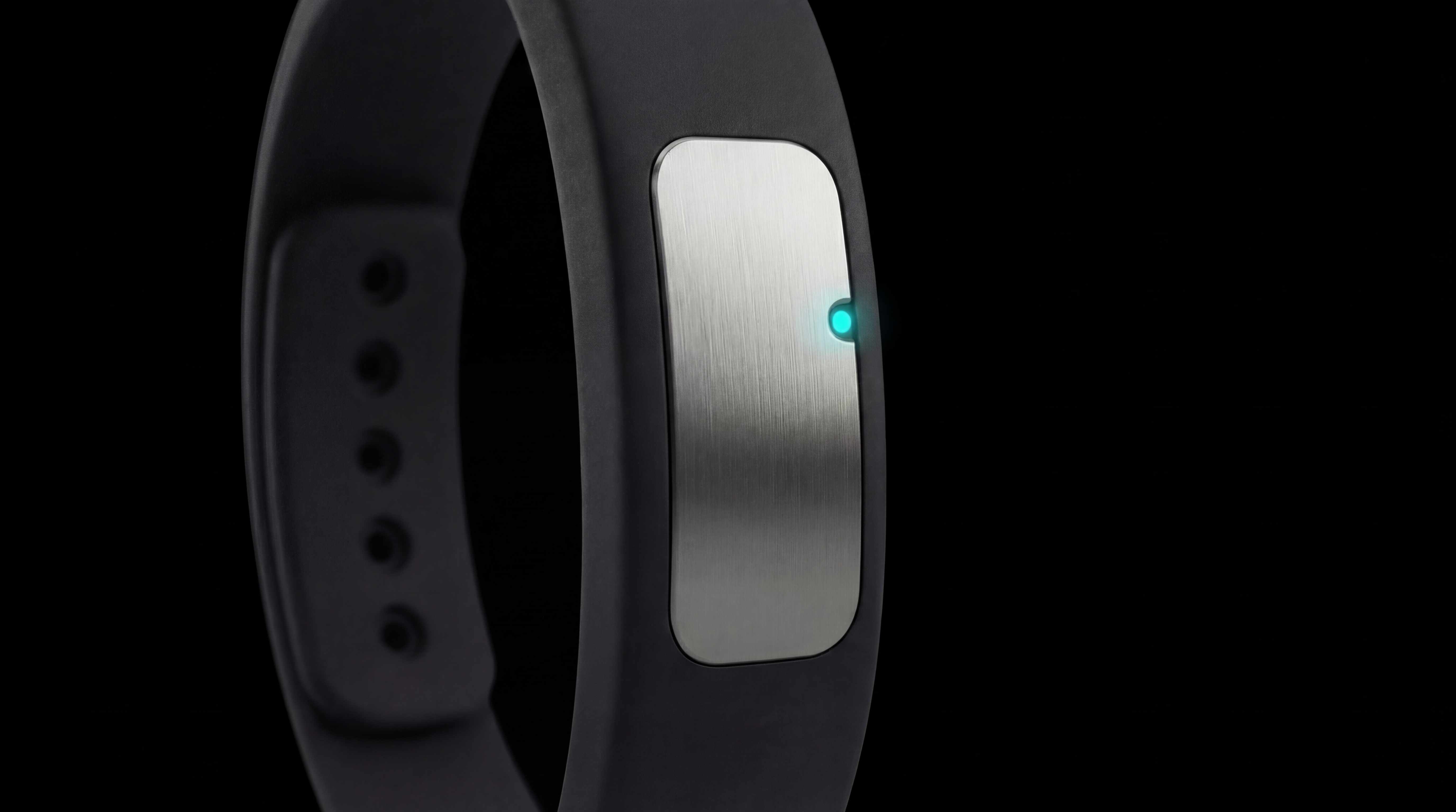 Nudge band close-up showing brushed steel plate with cyan LED